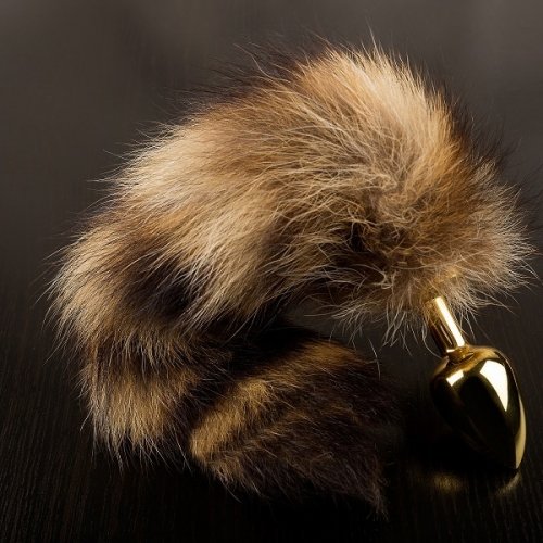 Маленькая золотистая анальная пробка с полосатым хвостом photo 1