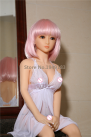 Миниатюрная секс кукла с розовыми волосами - 125 см photo 3