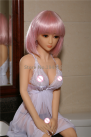 Миниатюрная секс кукла с розовыми волосами - 125 см photo 1